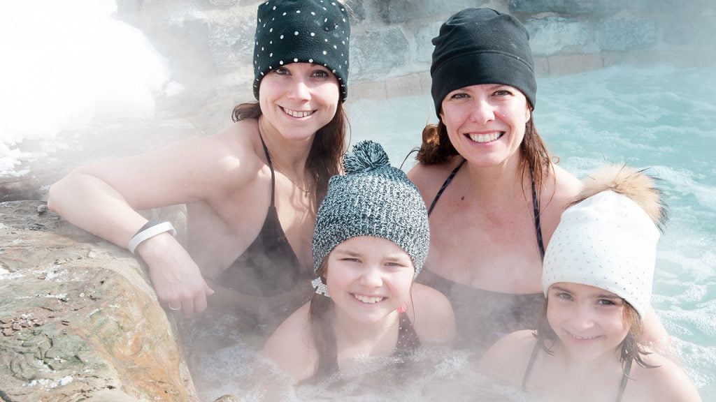 family in a hot tub