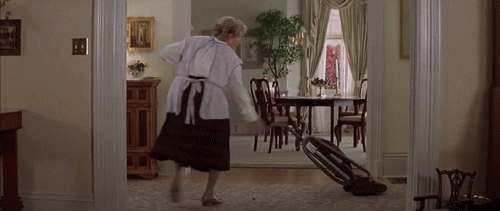 Mrs. Doubtfire dances with vacuum