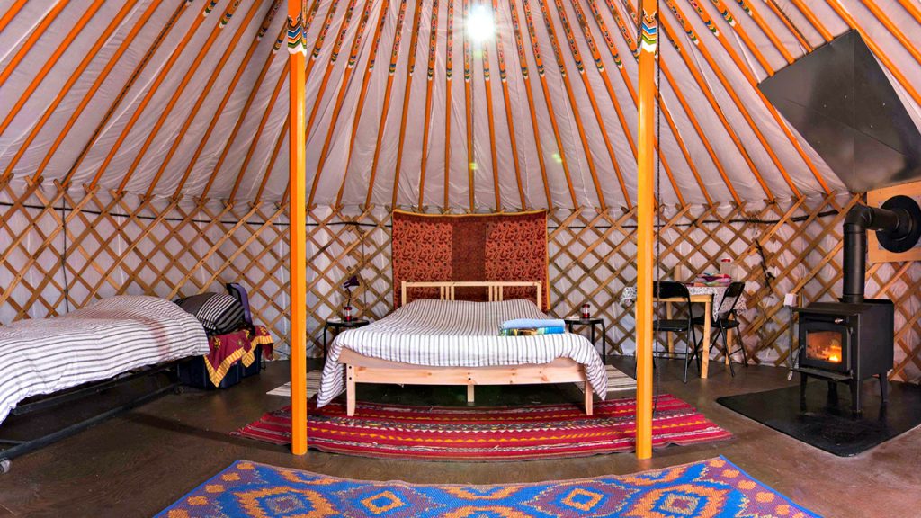 interior of a yurt with two beds