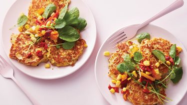 two plates with corn pancakes