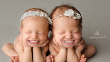 Two newborn babies with teeth