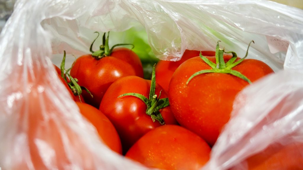 Close up of tomatos in plastic bag