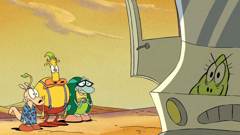 a cartoon kangaroo, cow and turtle standing in the desert