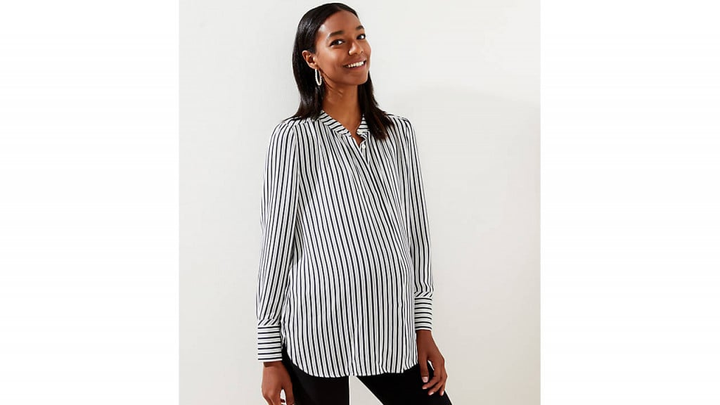 Woman in striped maternity blouse from Loft