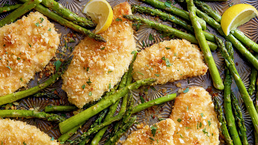 Sheet pan with breaded chicken and asparagus