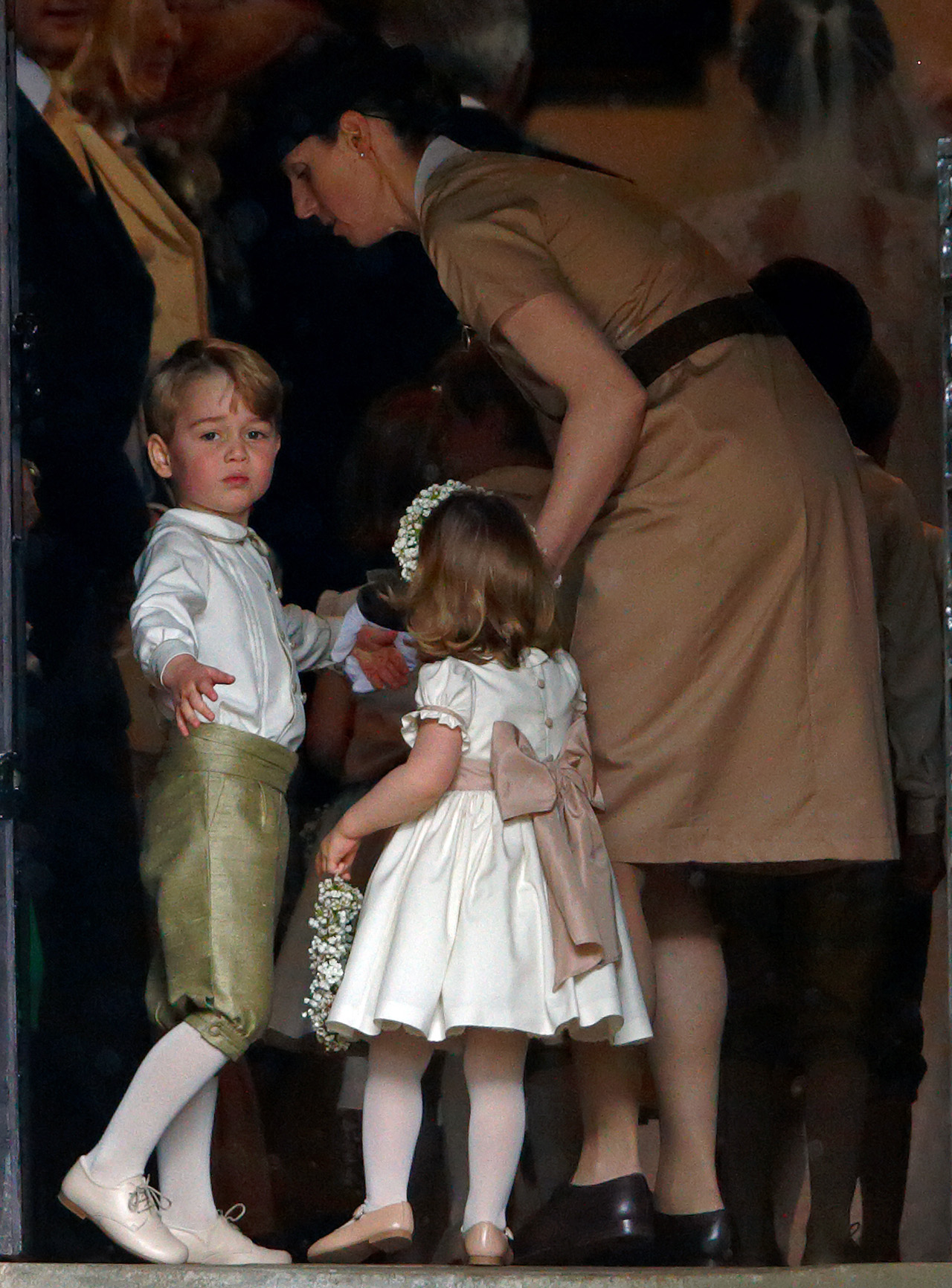 Prince George and Princess Charlotte with Nanny Maria at Pippa Middleton's wedding