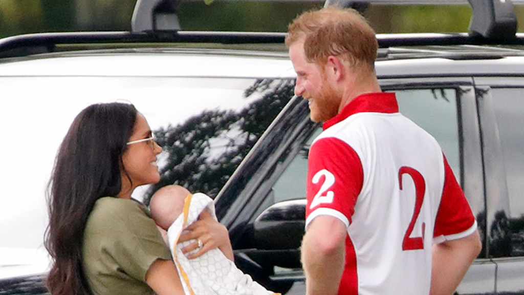 Prince Harry, Meghan Markle and baby Archie at a rugby match