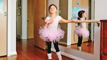 Girl wearing ballerina costume
