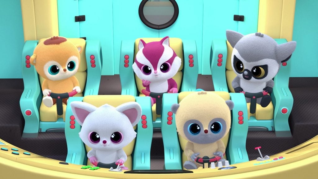 five fluffy animals in the cockpit of a spaceship