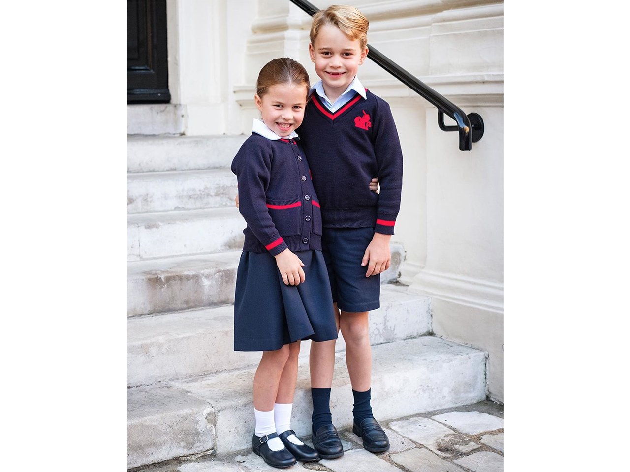 Princess charlotte and prince george posing in their school uniforms