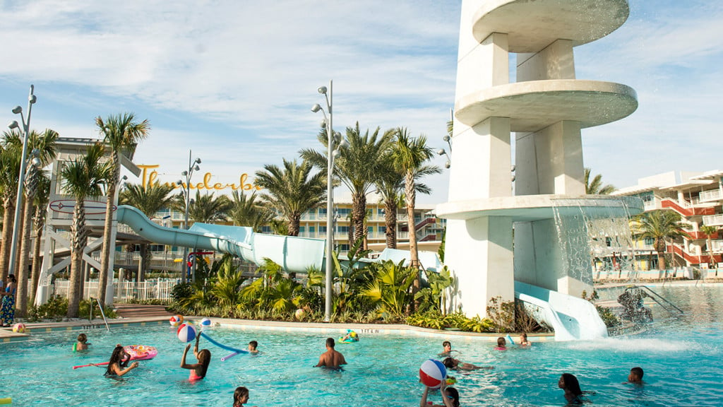 resort pool with kids playing in the water