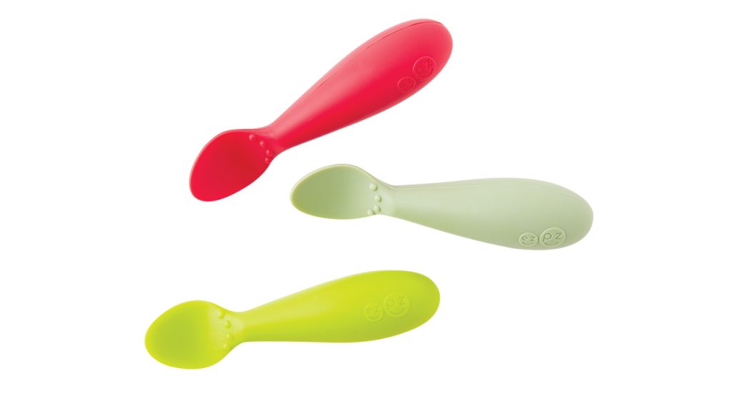 Tiny silicone spoons for infant training.