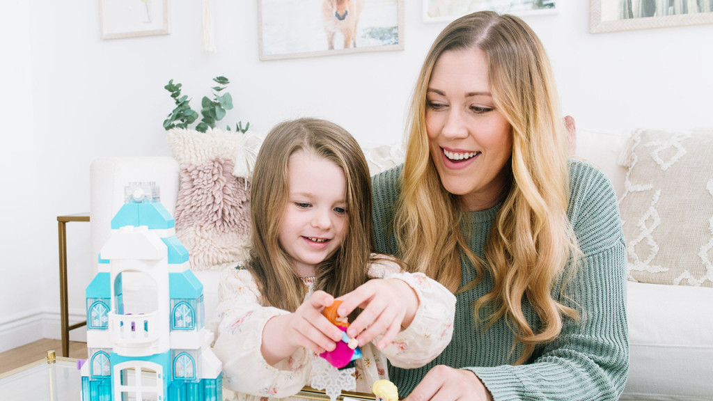 Renee M Leblanc playing with LEGO Duplo toy sets for young kids with her daughter