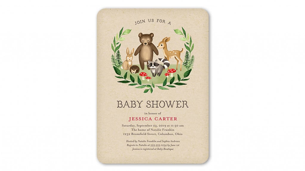 Baby shower invitation picturing an assortment of woodland animals