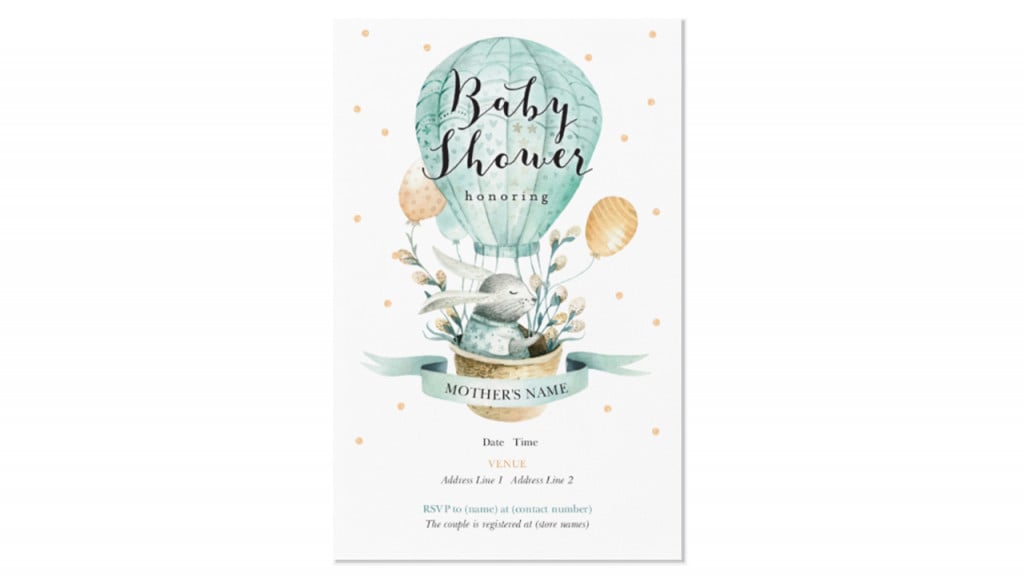 Baby shower invitation picturing a bunny in a hot air balloon