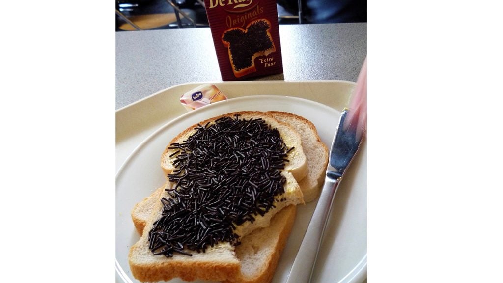 Bitten toast with chocolate sprinkles on it