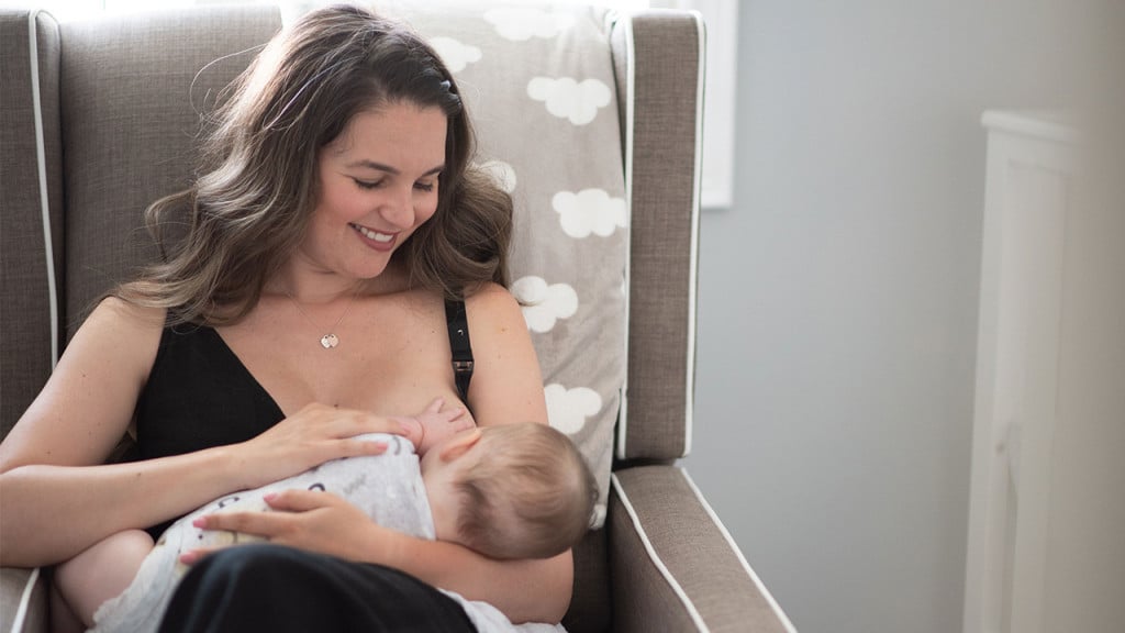 Author breastfeeding her child