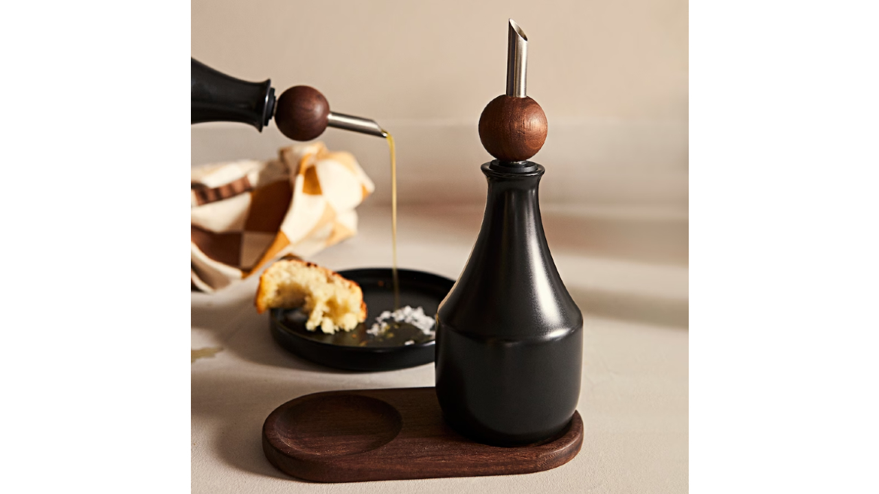 black ceramic bottle with wooden stopper