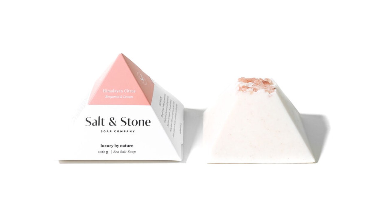 triangle-shaped sea salt soap next to packaging
