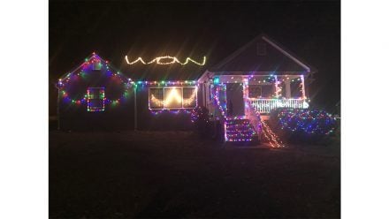 Holidays with kids: A house decorated with Christmas lights