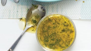 small bowl of dressing with spoon