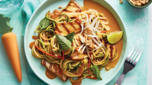veggie noodle pad thai on green dish
