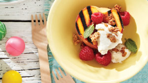 bowl with grilled peaches granola and marscapone