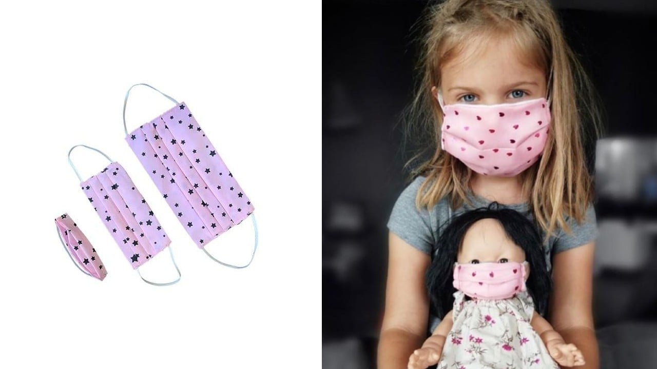 young girl and her doll wearing matching masks