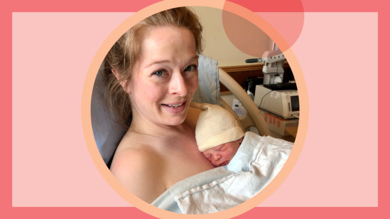 Mother in the hospital about to try breastfeeding newborn