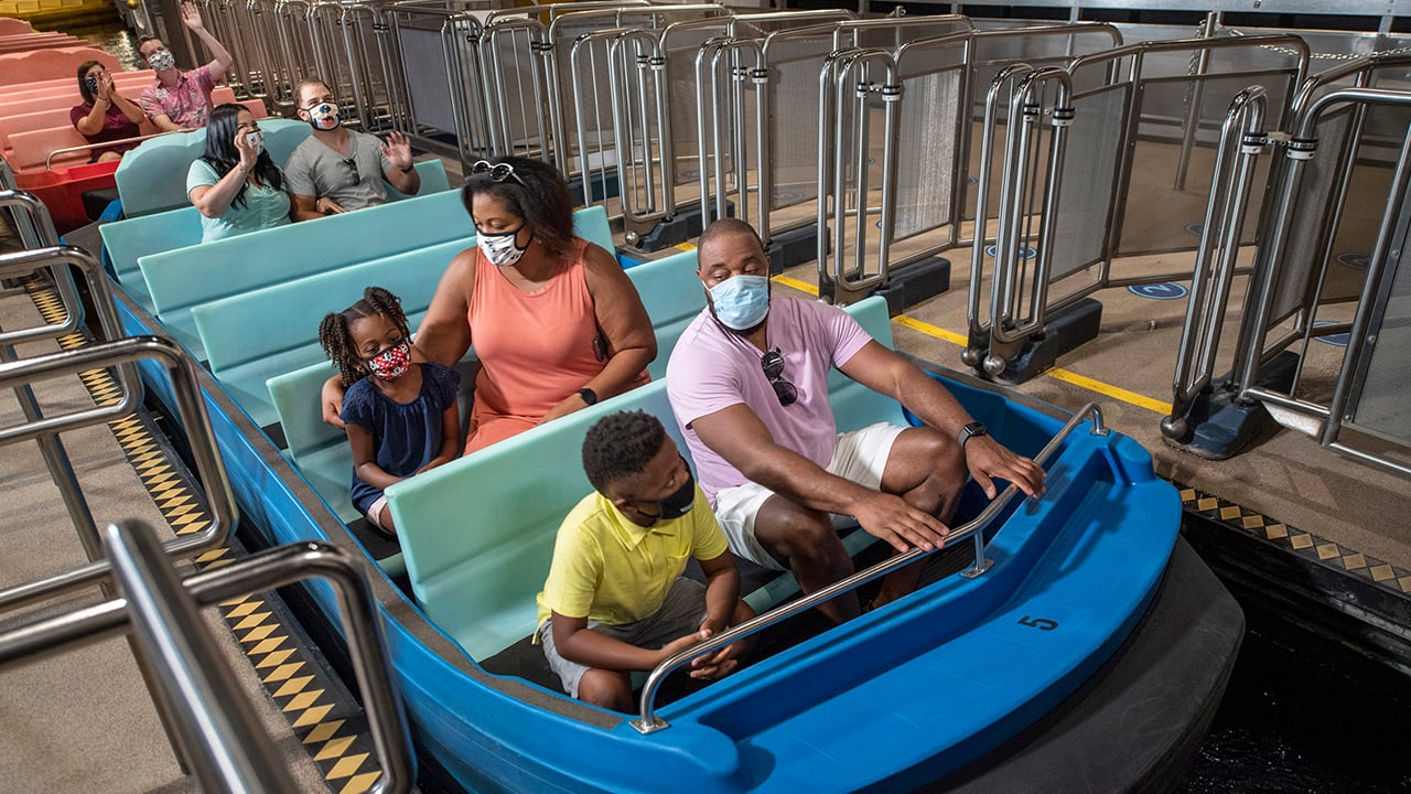 Guests loading onto an attraction at Disney world