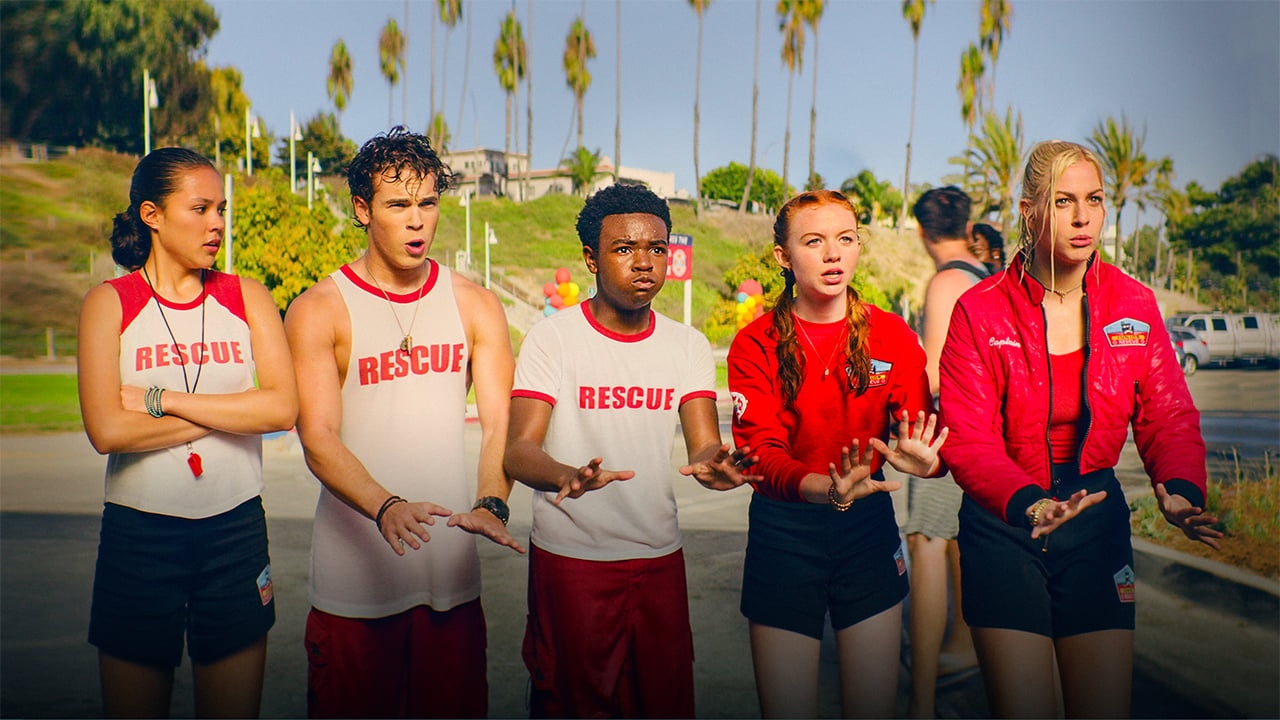 five teen lifeguards standing in a line
