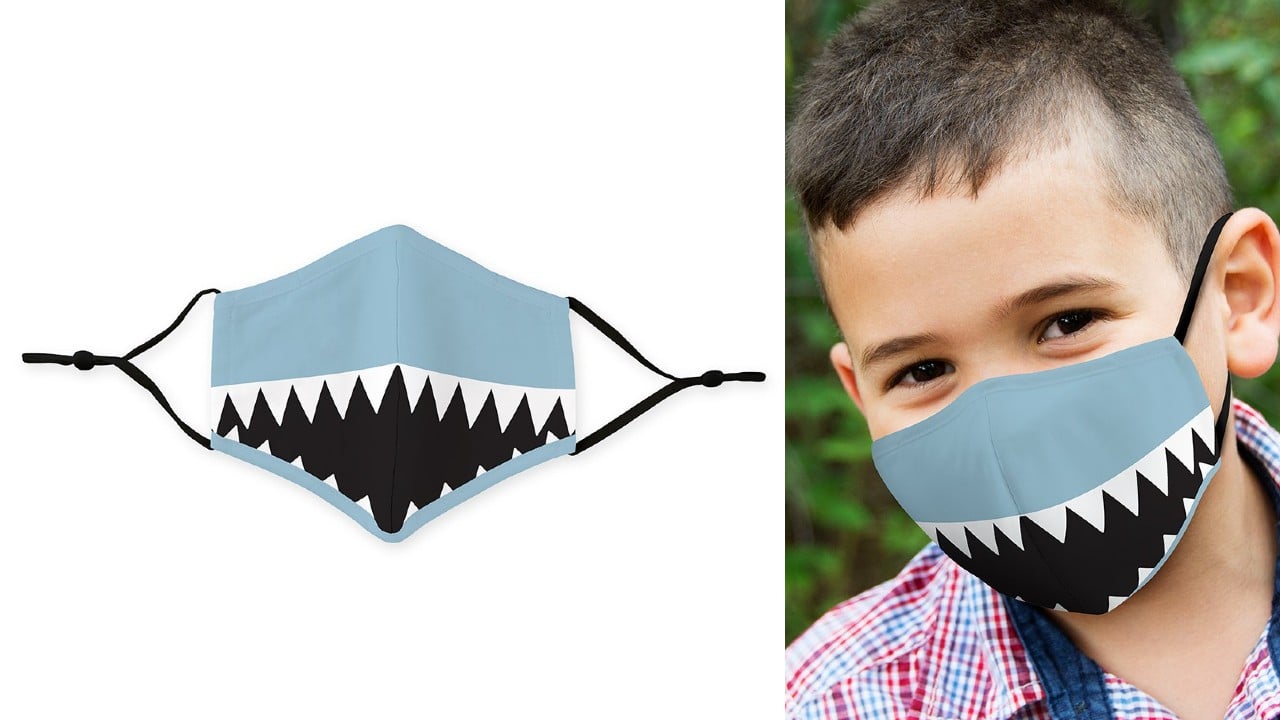 kid wearing shark-print mask