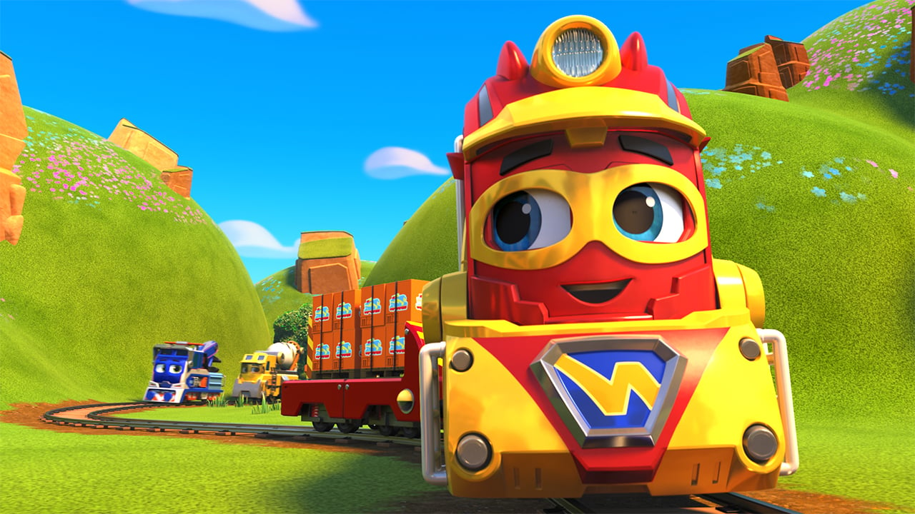 an animated train dressed as a superhero rides along the tracks