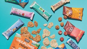 packaged snacks on teal background