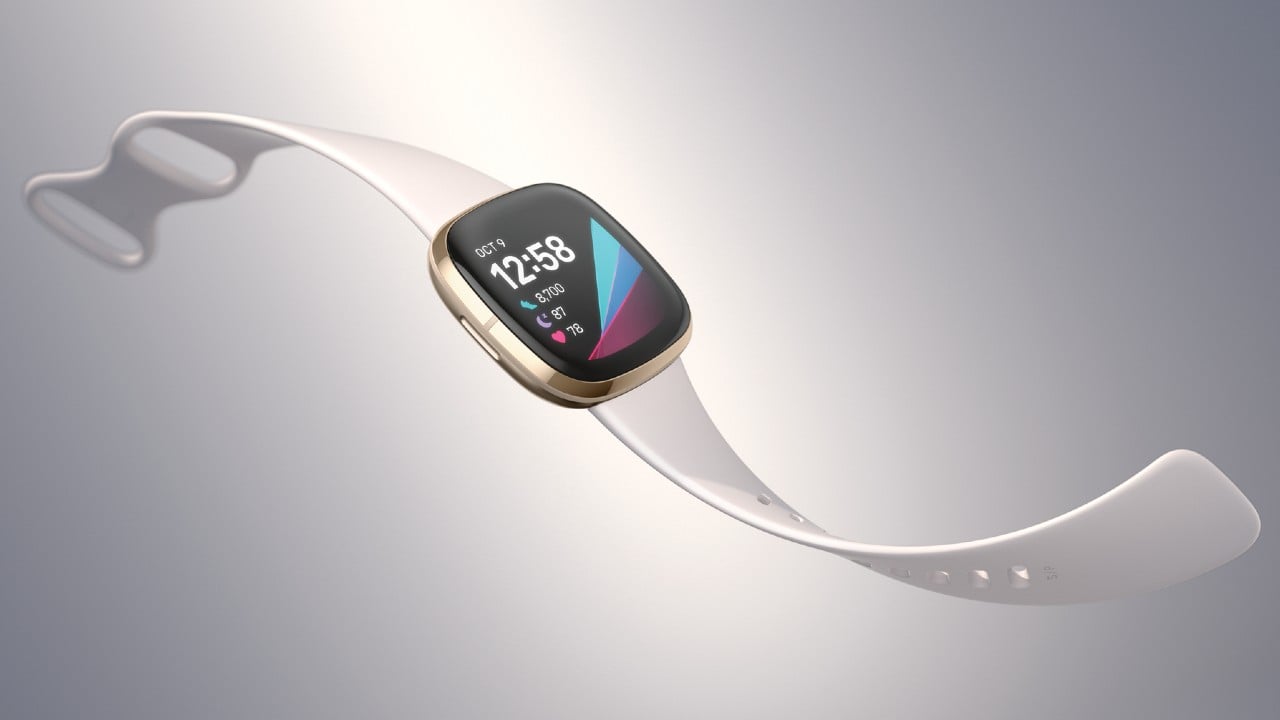 fitbit sense watch on stylized background