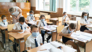 Elementary school class wearing masks during coronavirus pandemic