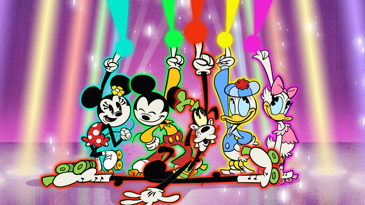 image of Mickey and friends glowing with colourful magic while pointing at the sky