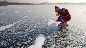 photo of young girl on the ice