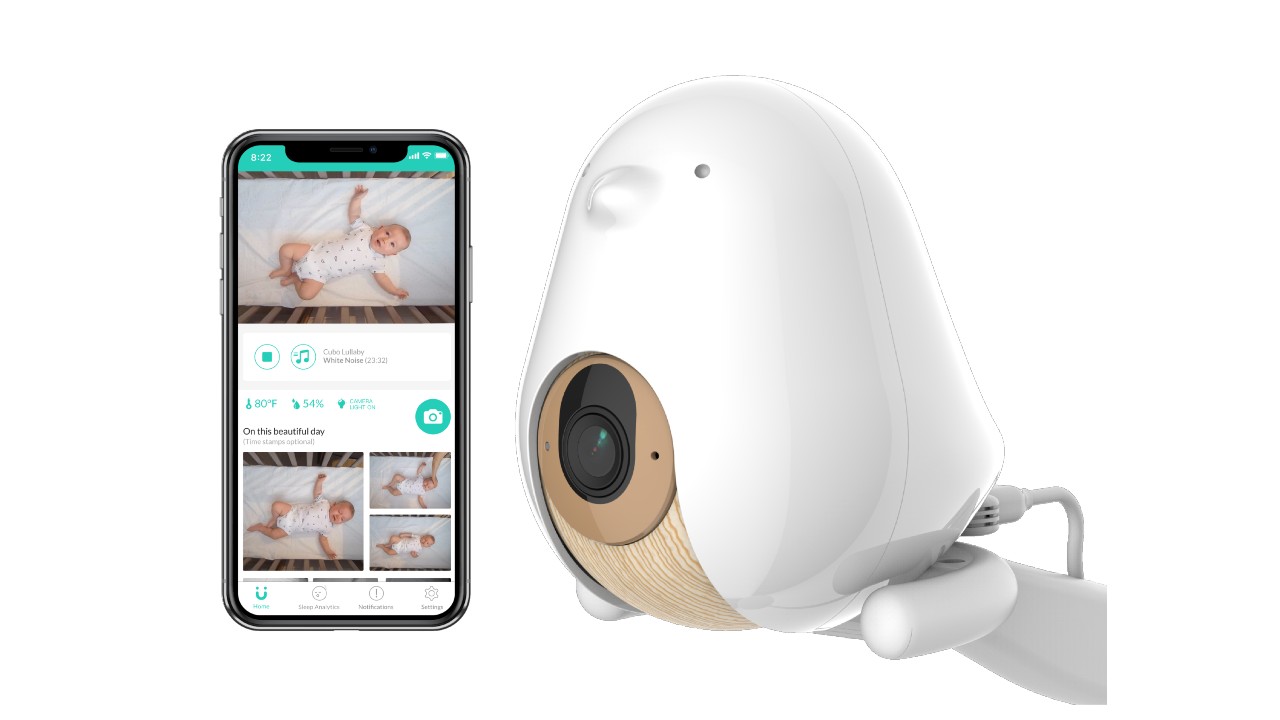 smart phone next to bird-shaped baby monitor
