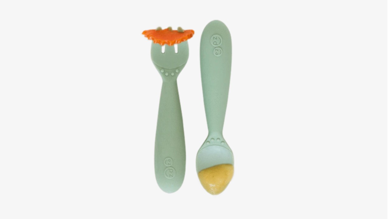 toddler utensils with soup and carrots
