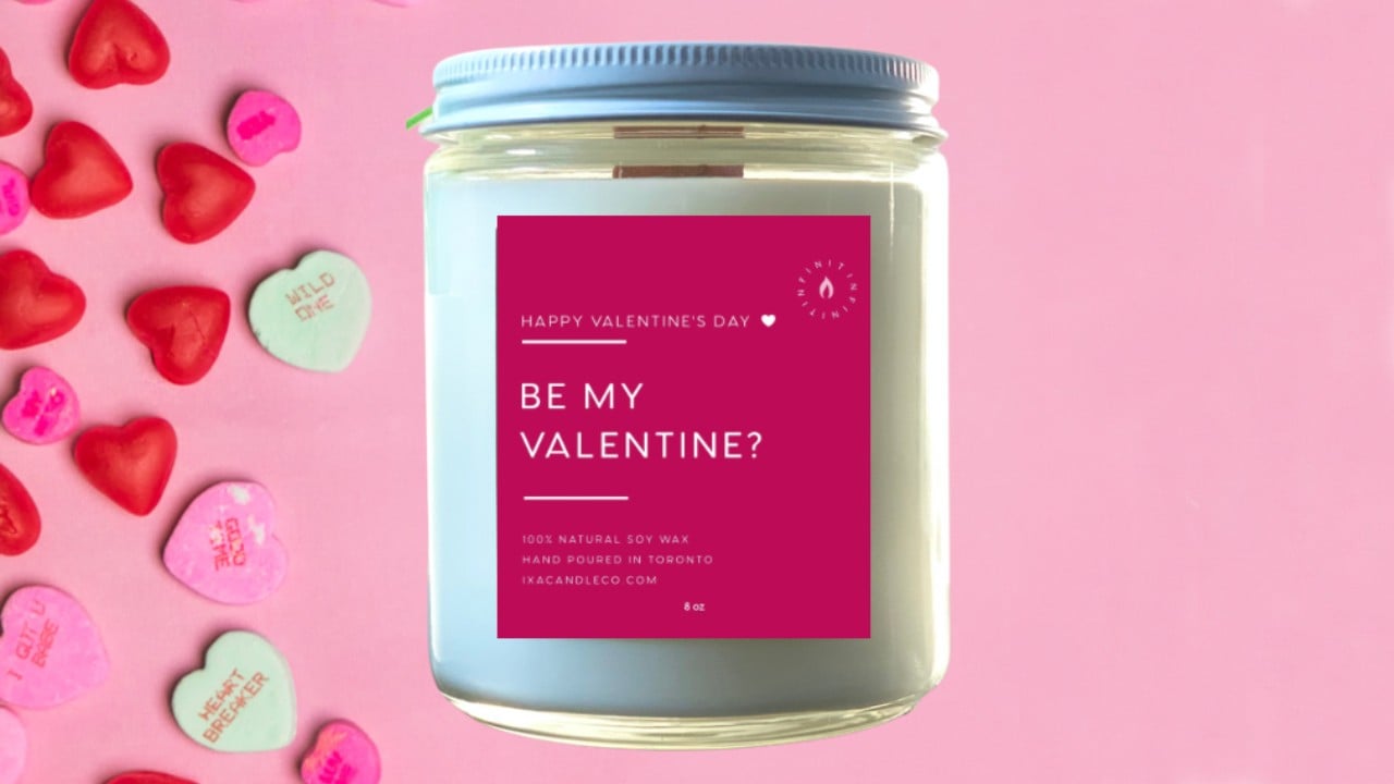 valentine's day candle on pink background