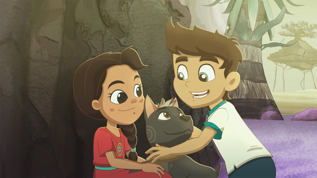 A still from Xico's Journey showing a pair of kids hugging a dog in the forest