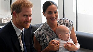 Prince Harry and MEghan with baby Archie in her lap during their tour of Australia and New Zealand for a story on the couple expecting their second child