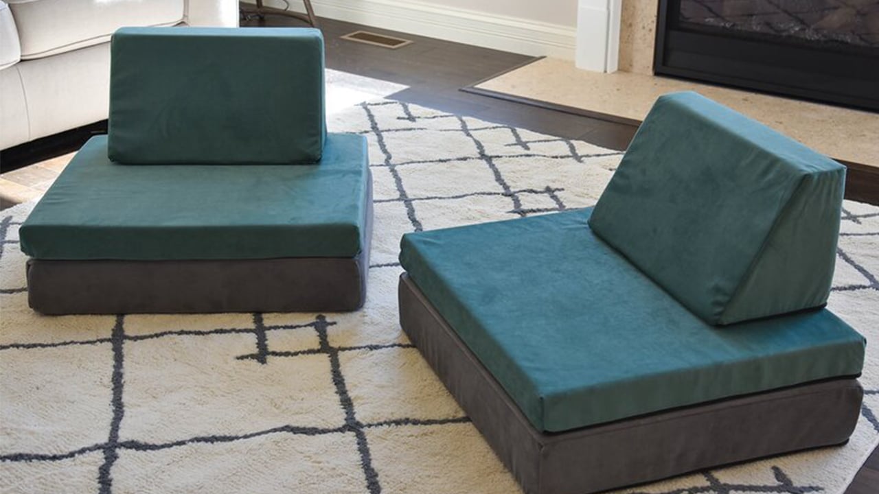 Photo of a modular kids couch set up as two chairs on a rug
