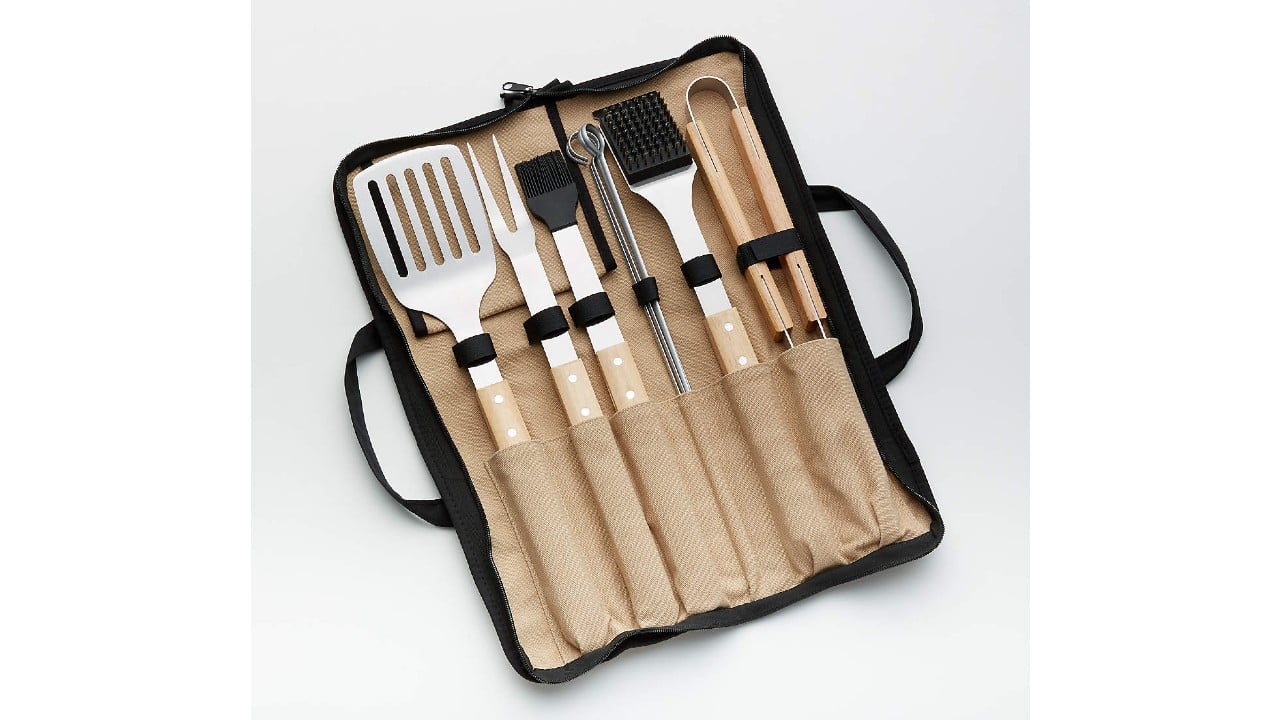 Wood-handled nine-piece barbecue tool set in a black and beige case