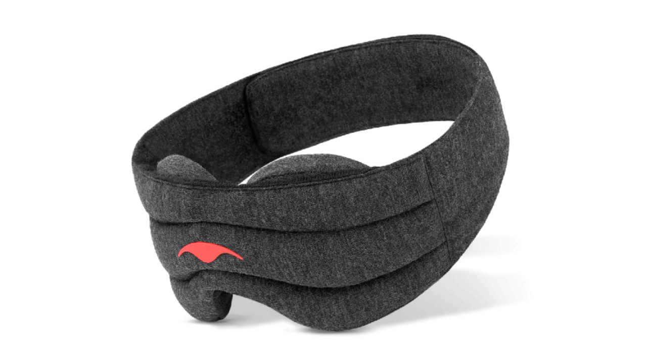 Dark grey weighted sleep mask with the Manta red logo on the front