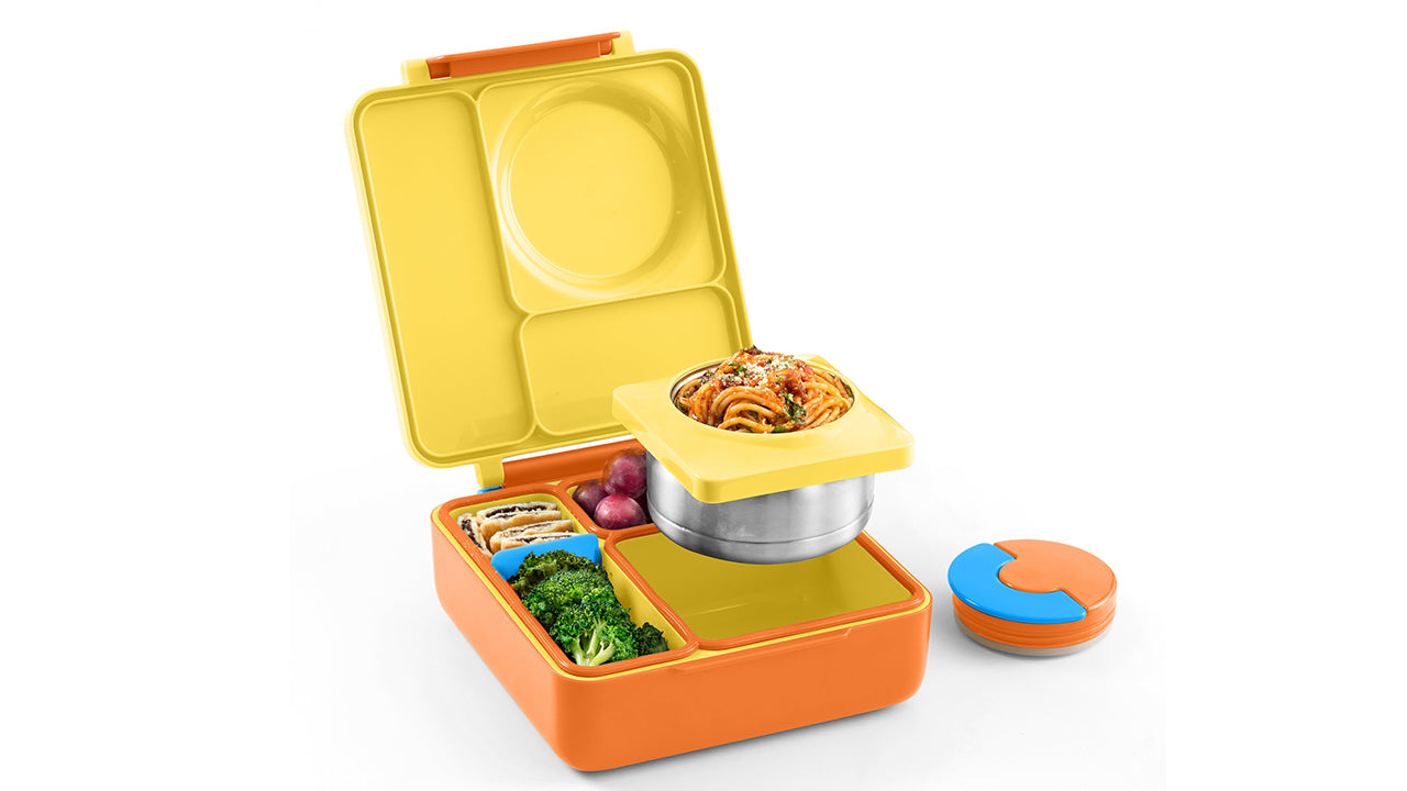 Orange bento box with four compartments including an insulated bowl