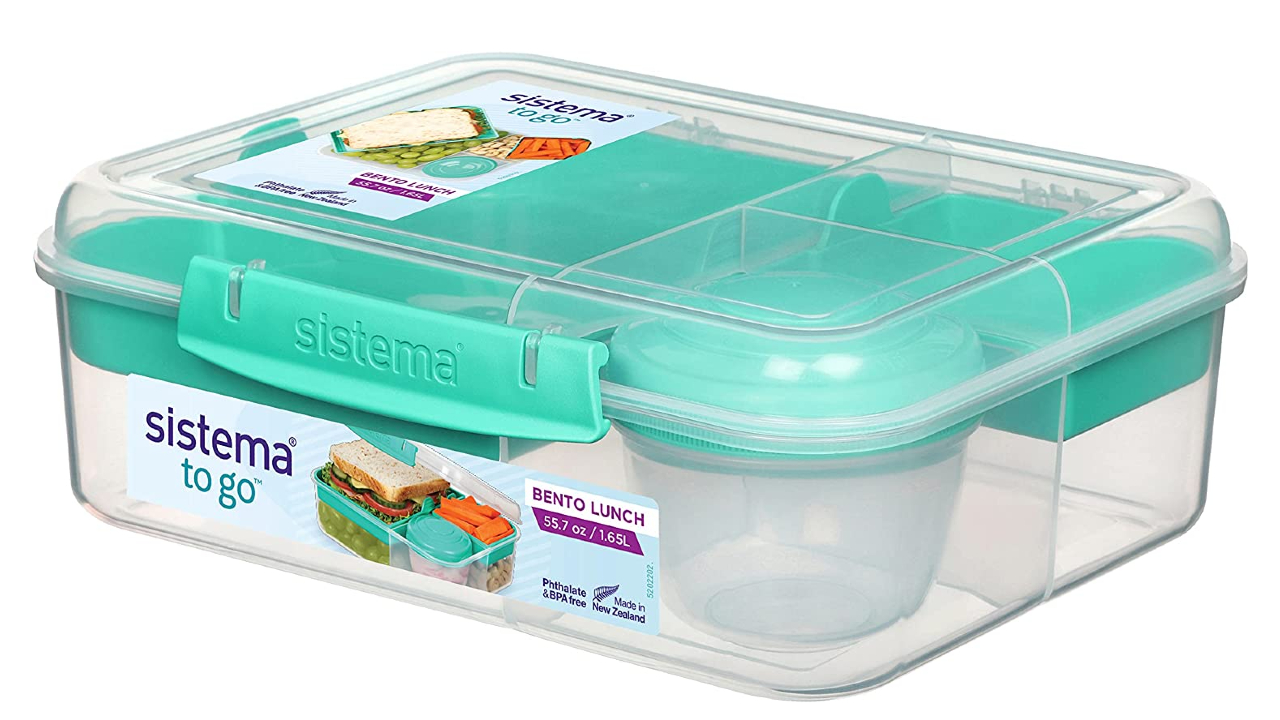 Four-compartment Bento box including a small containers for dips and cutlery
