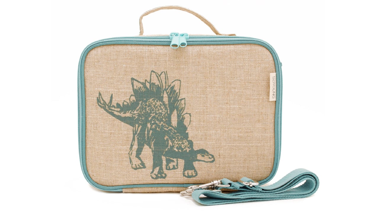 Burlap lunch bag with green stegosaurus and green zipper and carrying strap