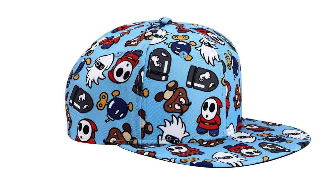 an image of a blue snapback hat with cartoon patterns.